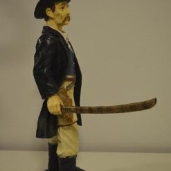 Sheriffi ja sapeli patsas