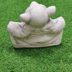 Peikkopatsas, vilauttelija, kuvattu takaapäin